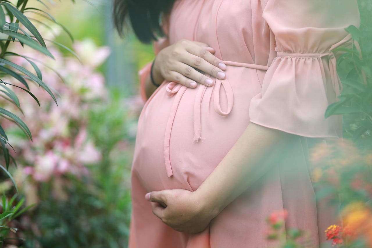 Expectant parent resting — IVF injection care at home