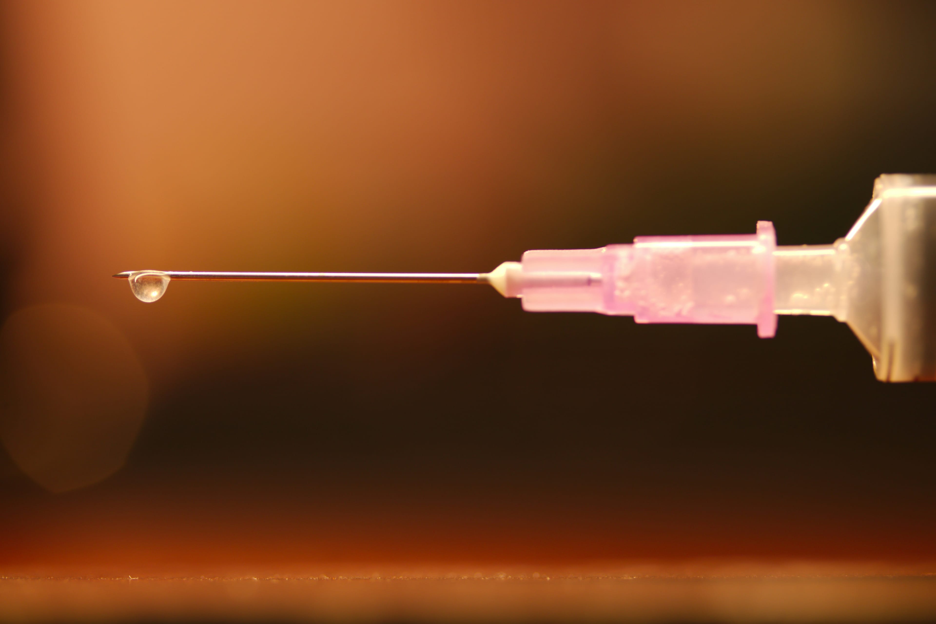 Nurse preparing fertility medication for at-home injection