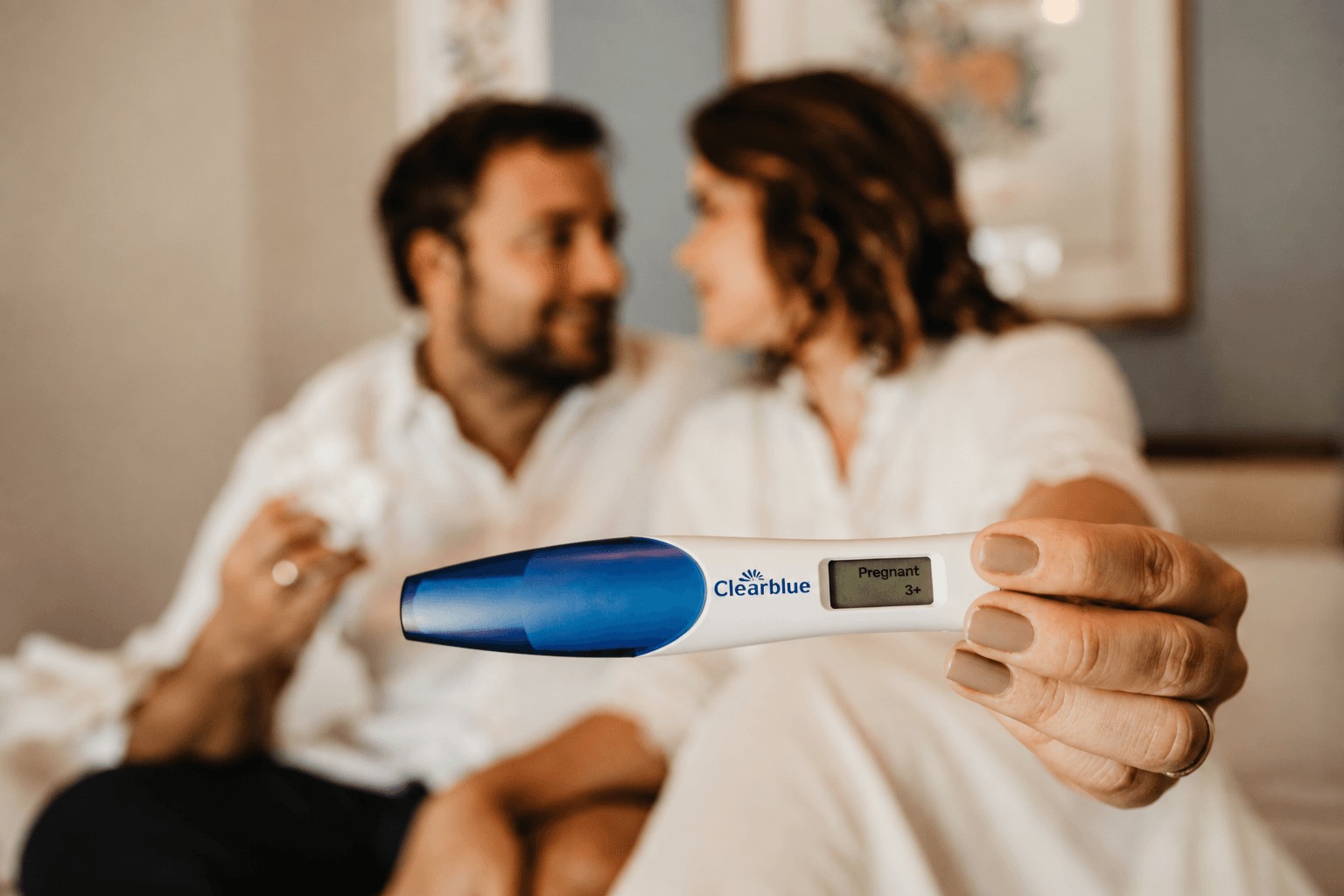 Patient reviewing fertility care materials at home